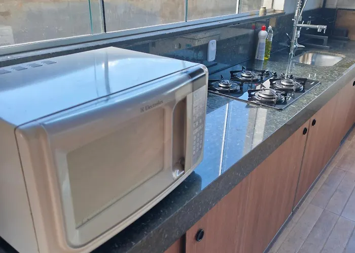 Quatro com suite e cozinha